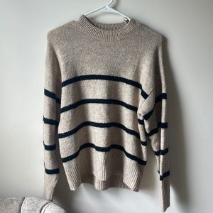 Black and Tan sweater. A little oversized. Knit material